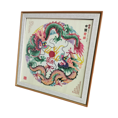 Two dragons play with pearls Colorful paper-cut picture